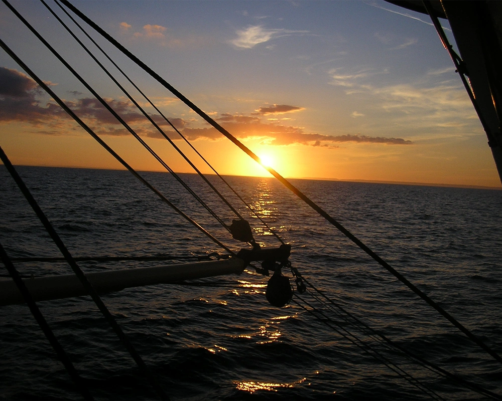 seafood boat sunset