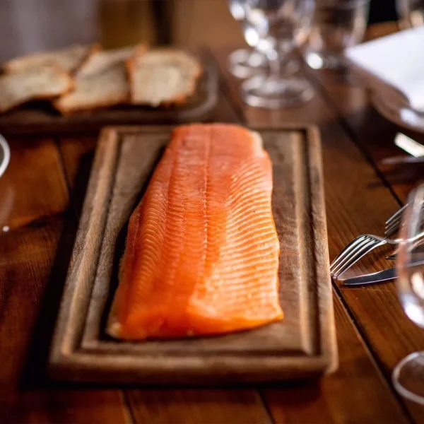 Smoked salmon on wooden board